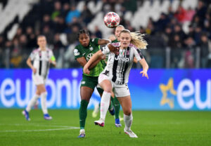 TURIN, ITALY - FEBRUARY 19: Lineth Beerensteyn of VfL Wolfsburg battles for possession with Mathilde Harviken of Juventus during the UEFA Women's Champions League 2025/26 KO play-offs Second Leg match between Juventus and VfL Wolfsburg at Juventus Stadium on February 19, 2026 in Turin, Italy. (Photo by Valerio Pennicino - UEFA/UEFA via Getty Images)