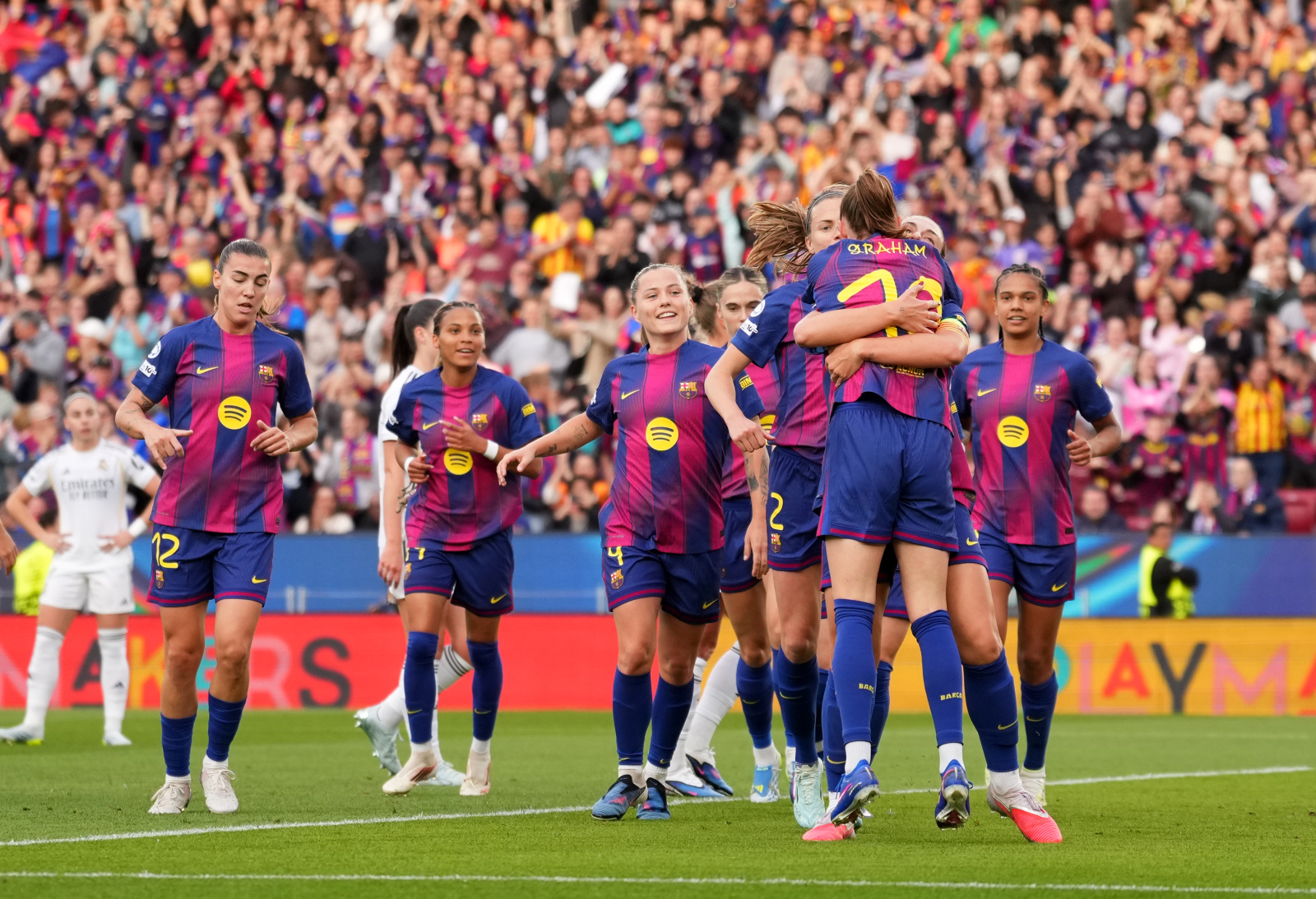 BARCELONA, SPAIN - APRIL 02: Caroline Graham Hansen of FC Barcelona celebrates scoring her team's second goal with teammate Alexia Putellas during the UEFA Women's Champions League 2025/26 Quarter-finals Second Leg match between FC Barcelona and Real Madrid CF at Nou Camp on April 02, 2026 in Barcelona, Spain. (Photo by Alex Caparros - UEFA/UEFA via Getty Images)