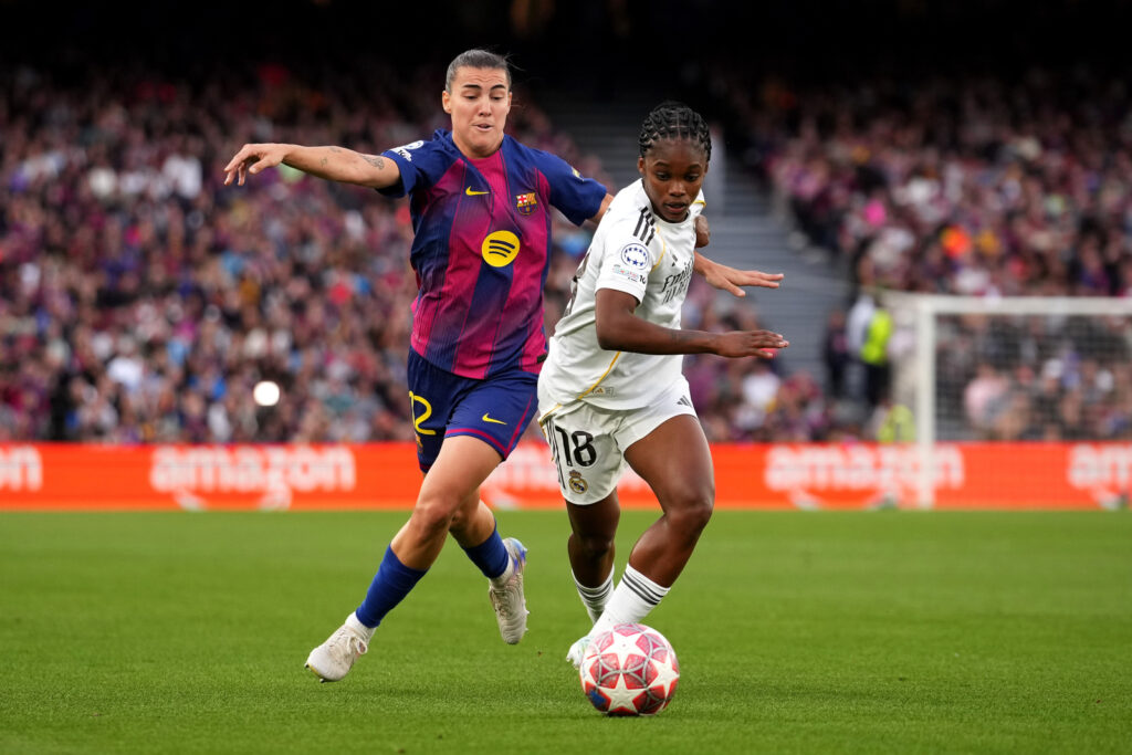 BARCELONA, SPAIN - APRIL 02: Linda Caicedo of Real Madrid CF is challenged by Patri Guijarro of FC Barcelona during the UEFA Women's Champions League 2025/26 Quarter-finals Second Leg match between FC Barcelona and Real Madrid CF at Nou Camp on April 02, 2026 in Barcelona, Spain. (Photo by Alex Caparros - UEFA/UEFA via Getty Images)