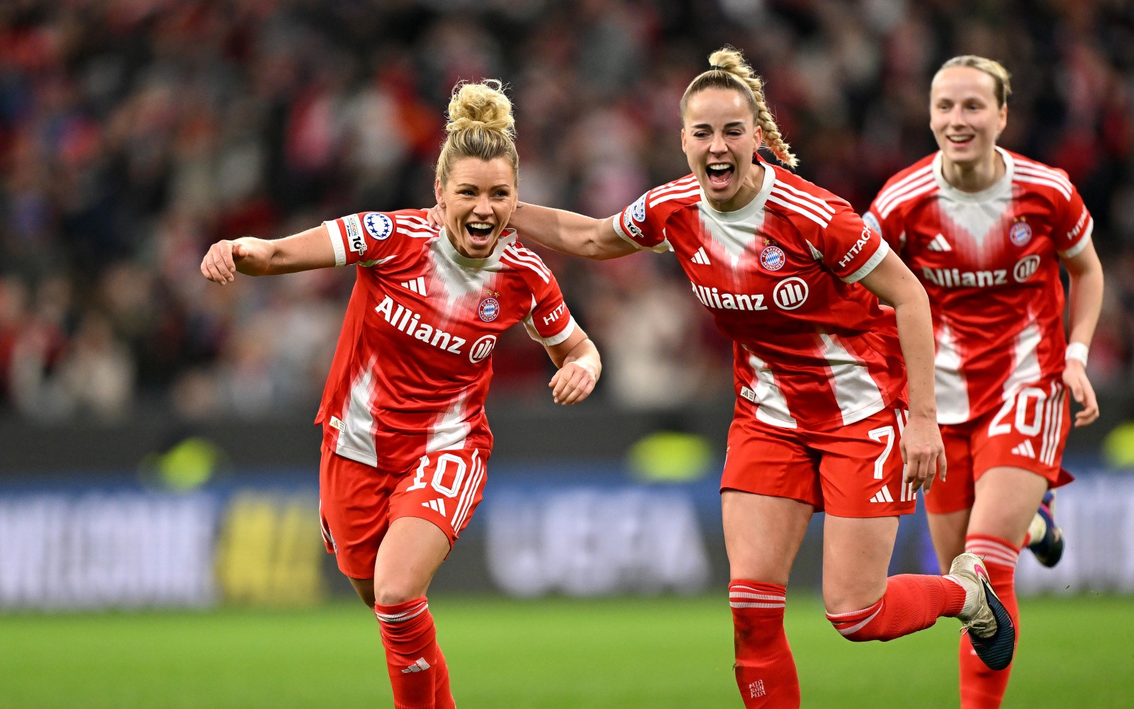 MUNICH, GERMANY - APRIL 01: Linda Dallmann of FC Bayern Munchen celebrates with teammate Giulia Gwinn after scoring her team's second goal during the UEFA Women's Champions League 2025/26 Quarter-finals Second Leg match between Manchester United FC and FC Bayern München at Munich Football Arena on April 01, 2026 in Munich, Germany. (Photo by Sebastian Widmann - UEFA/UEFA via Getty Images)