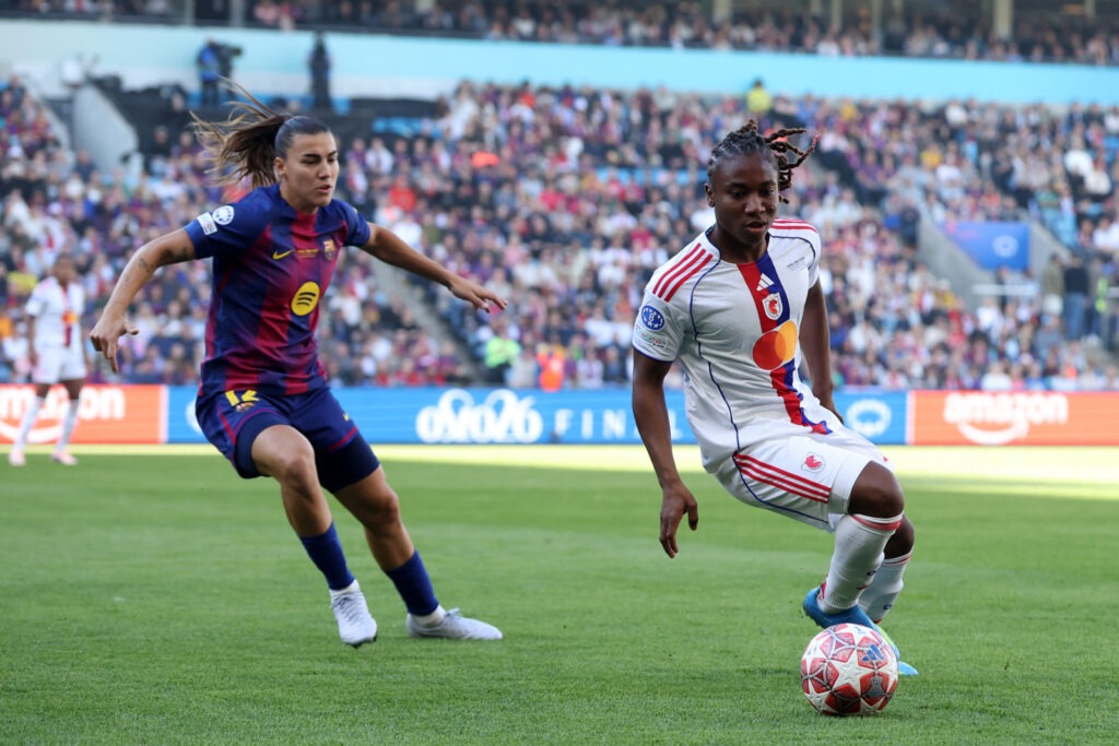 OSLO, NORWAY - MAY 23: Melchie Dumornay of OL Lyonnes controls the ball while under pressure from Patri Guijarro of FC Barcelona during the UEFA Women's Champions League Final 2026 match between FC Barcelona and OL Lyonnes at Ullevaal Stadion on May 23, 2026 in Oslo, Norway. (Photo by Florencia Tan Jun - UEFA/UEFA via Getty Images)