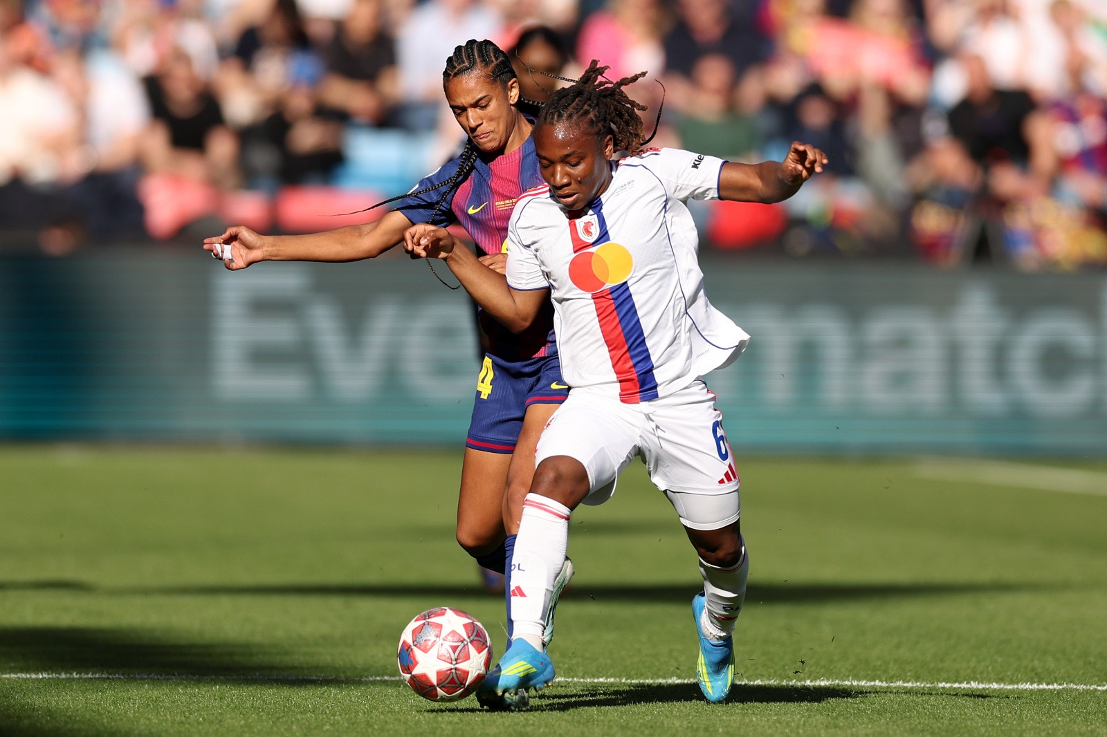 OSLO, NORWAY - MAY 23: Melchie Dumornay of OL Lyonnes is challenged by Esmee Brugts of FC Barcelona during the UEFA Women's Champions League Final 2026 match between FC Barcelona and OL Lyonnes at Ullevaal Stadion on May 23, 2026 in Oslo, Norway. (Photo by Judit Cartiel - UEFA/UEFA via Getty Images)