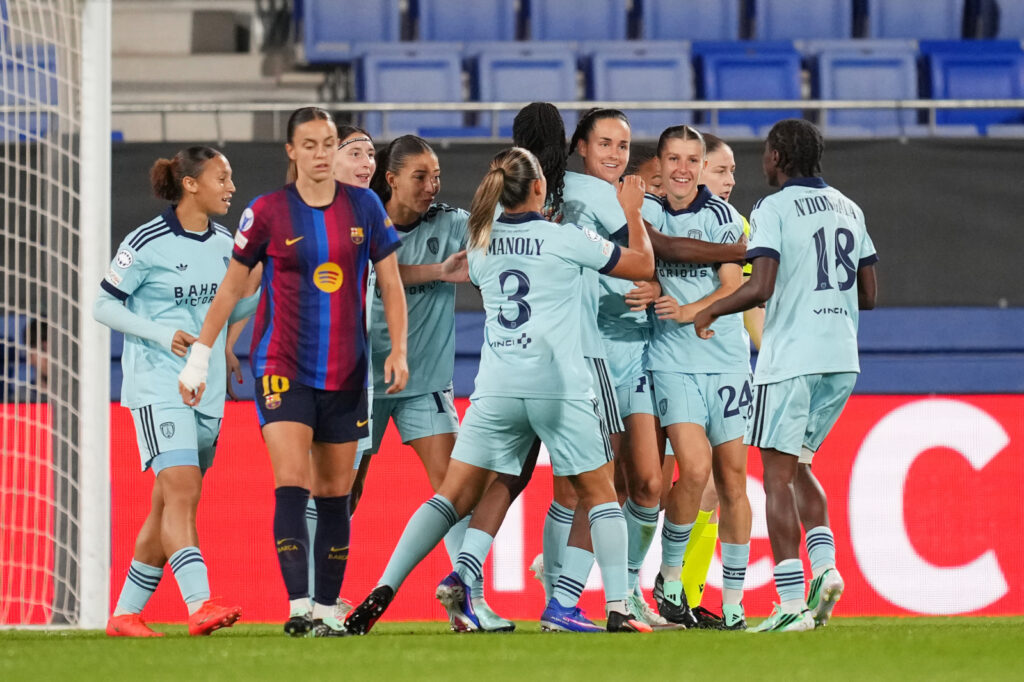 BARCELONA, SPAIN - SEPTEMBER 23: Evelyne Viens of Paris FC celebrates scoring her teams first goal with teammates during the UEFA Women's Champions League 2026/27 League Phase MD1 match between FC Barcelona and Paris FC at Estadi Johan Cruyff on September 23, 2026 in Barcelona, Spain. (Photo by Alex Caparros - UEFA/UEFA via Getty Images)