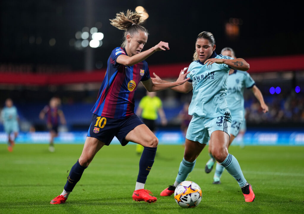 BARCELONA, SPAIN - SEPTEMBER 23: Caroline Graham Hansen of FC Barcelona is challenged by Manoly Baquerizo of Paris FC during the UEFA Women's Champions League 2026/27 League Phase MD1 match between FC Barcelona and Paris FC at Estadi Johan Cruyff on September 23, 2026 in Barcelona, Spain. (Photo by Alex Caparros - UEFA/UEFA via Getty Images)
