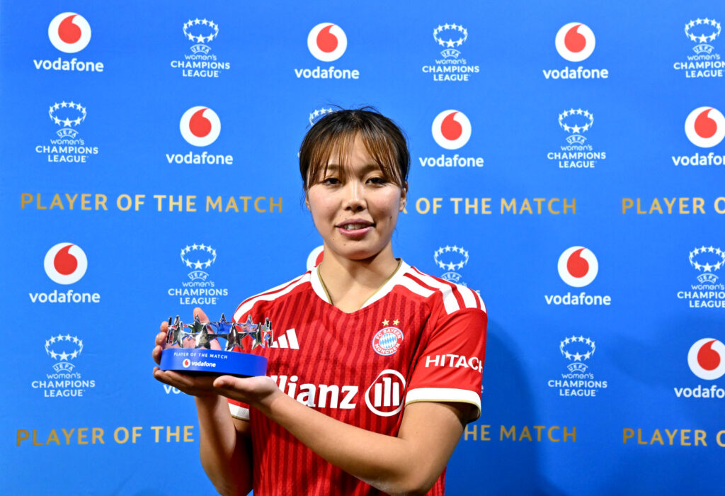 UNTERHACHING, GERMANY - OCTOBER 28: Momoko Tanikawa of FC Bayern Munchen poses for a photo with the Vodafone Player of the Match award after the UEFA Women's Champions League 2026/27 League Phase MD3 match between FC Bayern München and Real Madrid C.F. at Stadion Am Sportpark on October 28, 2026 in Unterhaching, Germany. (Photo by Sebastian Widmann - UEFA/UEFA via Getty Images)