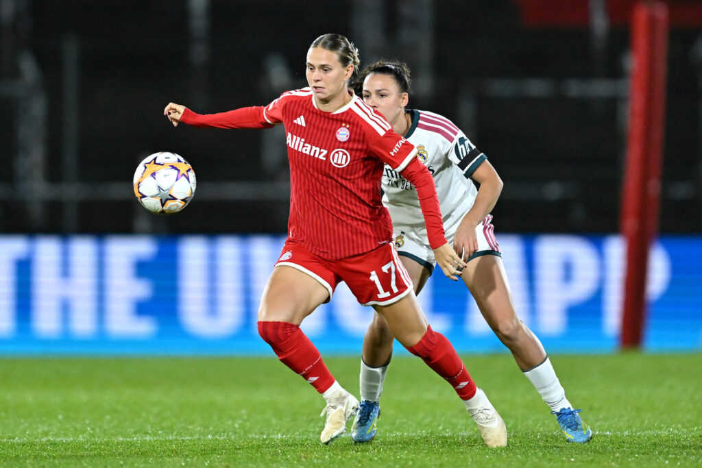 UNTERHACHING, GERMANY - OCTOBER 28: Klara Buhl of FC Bayern Munchen is put under pressure from Silvia Cristobal of Real Madrid CF during the UEFA Women's Champions League 2026/27 League Phase MD3 match between FC Bayern München and Real Madrid C.F. at Stadion Am Sportpark on October 28, 2026 in Unterhaching, Germany. (Photo by Sebastian Widmann - UEFA/UEFA via Getty Images)