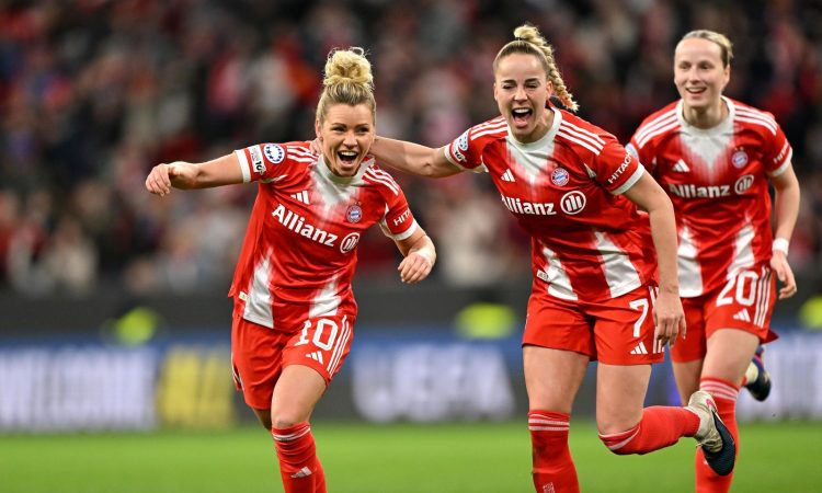 MUNICH, GERMANY - APRIL 01: Linda Dallmann of FC Bayern Munchen celebrates with teammate Giulia Gwinn after scoring her team's second goal during the UEFA Women's Champions League 2025/26 Quarter-finals Second Leg match between Manchester United FC and FC Bayern München at Munich Football Arena on April 01, 2026 in Munich, Germany. (Photo by Sebastian Widmann - UEFA/UEFA via Getty Images)